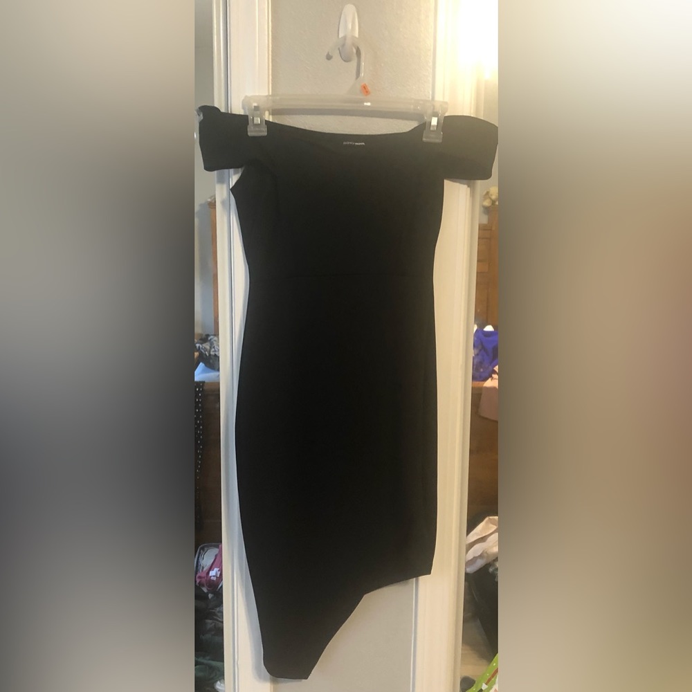 Black off the shoulder short dress/shorter on the left side, left thigh may show